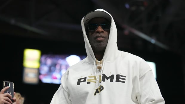 Colorado Buffaloes head coach Deion Sanders enters the Coors Events Center before the start of the second half against the Colorado State Rams.